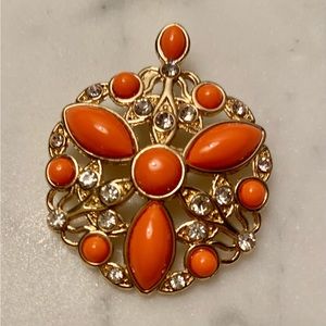 Coral/Diamond/Gold Round pendant 1 1/2” in diameter.